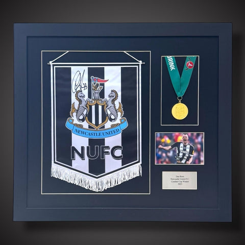 Dan Burn Signed & Framed Newcastle Pennent With Replica Caribo Cup Medal £2490